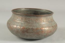 AN EARLY 18TH CENTURY PERSIAN SAFAVID TINNED COPPER BOWL, with engraved calligraphy, 22cm diameter.