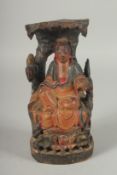 AN 18TH-19TH CENTURY CHINESE CARVED WOOD POLYCHROME TEMPLE FIGURE OF GUANYIN, 21.5cm high.