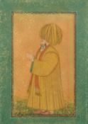 A PERSIAN QAJAR MINIATURE PAINTING OF A FIGURE, in a micro mosaic inlaid frame, glazed, 12.5