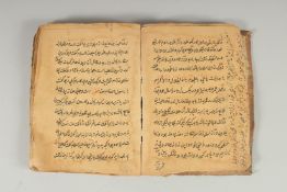 AN ISLAMIC INDO PERSIAN LEATHER BOUND BOOK ON HADITH, 17.5cm x 13cm.
