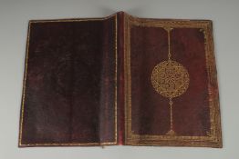 A FINE 19TH CENTURY POSSIBLY MOROCCAN OR OTTOMAN TOOLED LEATHER DOCUMENT HOLDER, 32.5cm x 25cm.