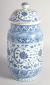 A CHINESE BLUE AND WHITE PORCELAIN LANTERN VASE AND COVER, 32cm high.