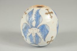 A TURKISH OTTOMAN ARMENIAN POTTERY HANGING BALL, 8cm.