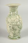 A CHINESE CELADON VASE.