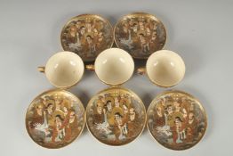 THREE JAPANESE SATSUMA CUPS AND SAUCERS, together with two spare saucer dishes, (8 pieces).