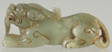 A CARVED JADE LION DOG, 7.5cm long.