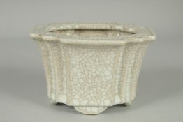 A SMALL CHINESE CRACKLE GLAZE PORCELAIN PLANT POT, 12.5cm wide.