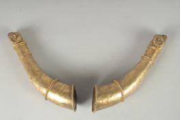 A PAIR OF OTTOMAN TURKISH SILVER RAMS HEAD DRINKING CUPS, with 19th century Ottoman marks, 24cm