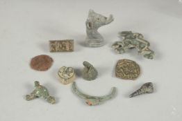 A COLLECTION OF ISLAMIC - POSSIBLY NISHAPUR METAL RELICS, (qty).