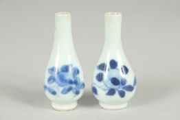 A PAIR OF CHINESE MINIATURE BLUE AND WHITE PORCELAIN VASES, 5.5cm high.