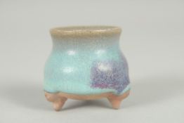A SMALL CHINESE JUN WARE POTTERY WELL, 4.5cm high.