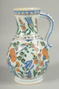 AN OTTOMAN TURKISH KUTAHYA GLAZED POTTERY WATER FLASK, 23cm high.