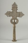 A 19TH CENTURY ETHIOPIAN COPTIC WHITE METAL CROSS, 31cm high.