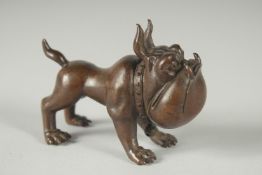 A JAPANESE BRONZE OKIMONO OF A DOG.