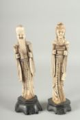 A PAIR OF CHINESE CARVED BONE FIGURES.