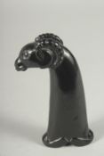 A 19TH CENTURY CARVED BLACK HARDSTONE RAMS HEAD DAGGER HANDLE, 15cm long.