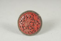 A SMALL CHINESE CINNABAR LACQUER BROOCH.