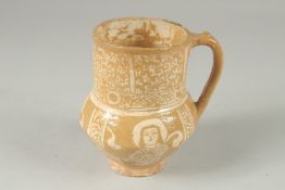 A FATIMID LUSTRE GLAZED POTTERY JUG, 15cm high.