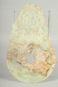 A LARGE CHINESE JADE BI DISK, with pierced archaic-style decoration, 34cm x 21cm.