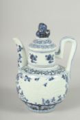 A CHINESE BLUE AND WHITE PORCELAIN LIDDED JUG, with carved phoenix.
