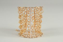 A REBERTO CREVILLI GOLD AND DIAMOND SET CHAIN LINK BRACELET set with forty diamonds, in a Cartier