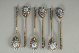 A SET OF SIX RUSSIAN SILVER AND ENAMEL SPOONS. 10.5cm long. Marks: 84. K.P. Weight: 60gms.