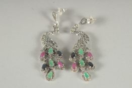 A PAIR OF SILVER EMERALD, SAPPHIRE AND RUBY ART DECO DESIGN, PEACOCK EARRINGS.