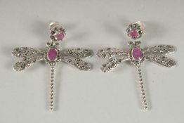 A PAIR OF SILVER, RUBY, AMETHYST, DRAGONFLY EARRINGS.