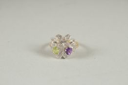 A SILVER GOLD PLATED SWEETHEART RING.