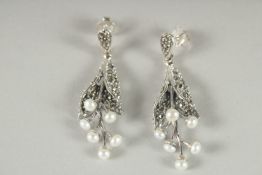 A PAIR OF SILVER , PEARL, MARCASITE DROP EARRINGS.