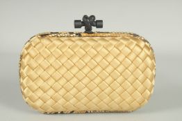 A BOTTEGO VENETO RAFFERO CLUTCH BAG. 6.5ins long with dust bag.