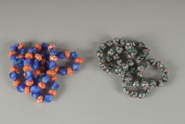 TWO STRINGS OF VENETIAN BEADS.