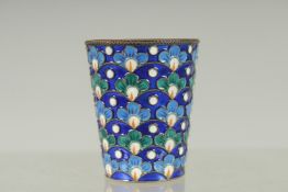 A RUSSIAN SILVER AND ENAMEL VODKA TOT. 4.5cm high. Weight: 26gms.