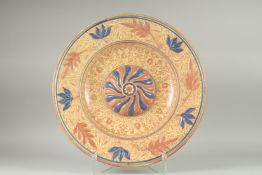 AN HISPANO- MORESQUE LUSTRE DISH with moulded central base, floral moulded border and stylised