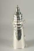 A SILVER PLATED LIGHTHOUSE COCKTAIL SHAKER. 14ins high.