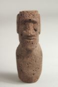 A CARVED LAVA STONE POLYNESIAN MAN. 5ins.