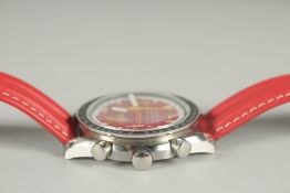 A GENTLEMAN'S OMEGA SPEEDMASTER SCHUMACHER RED DIAL WRIST WATCH. NO. 55206245. Purchased from Asprey