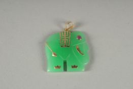A 14CT GOLD MOUNTED ELEPHANT PENDANT.