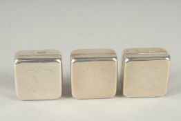 A SET OF THREE SILVER SQUARE SHAPED PILL BOXES, each engraved with initials K A P. Stamped 925, 1.