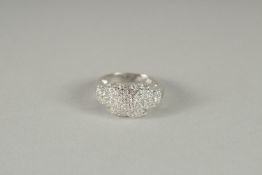 A SILVER AND C Z RING.