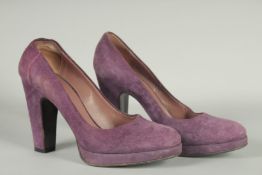 A PAIR OF MIU MIU MAUVE SUEDE SHOES. Size UK 36.5, boxed.