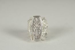 A SILVER COFFIN AND BAT SKELETON RING.