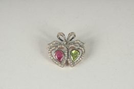 A GOLD AND SILVER DIAMOND & PEARL DOUBLE HEART BROOCH.