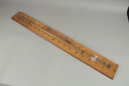A STICK BAROMETER. 36ins high.