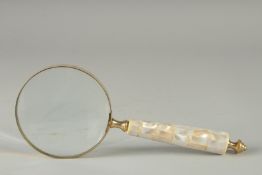 A MAGNIFYING GLASS with mother of pearl handle.