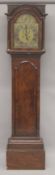AN 18TH CENTURY WALNUT LONG CASE CLOCK with eight day movement, the arch brass dial with strike/
