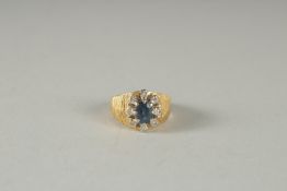 AN 18CT GOLD SAPPHIRE, DIAMOND CLUSTER RING.