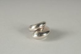 A MODERNIST STYLE RING.
