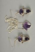 A SILVER AMETHYST NECKLACE AND EARRINGS.