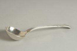 A GEORGE IV SILVER FIDDLE PATTERN SOUP LADLE. London 1823. Maker: W. Chawner